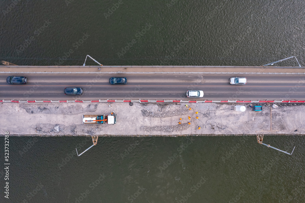 Modernization and repair of highway bridge aerial top view Modernization and repair of highway bridge aerial top view