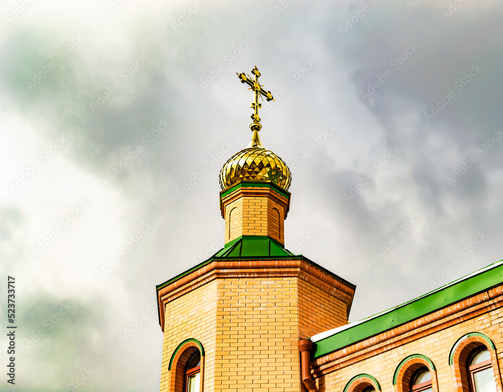 Obraz premium Christian church cross in high steeple tower for prayer