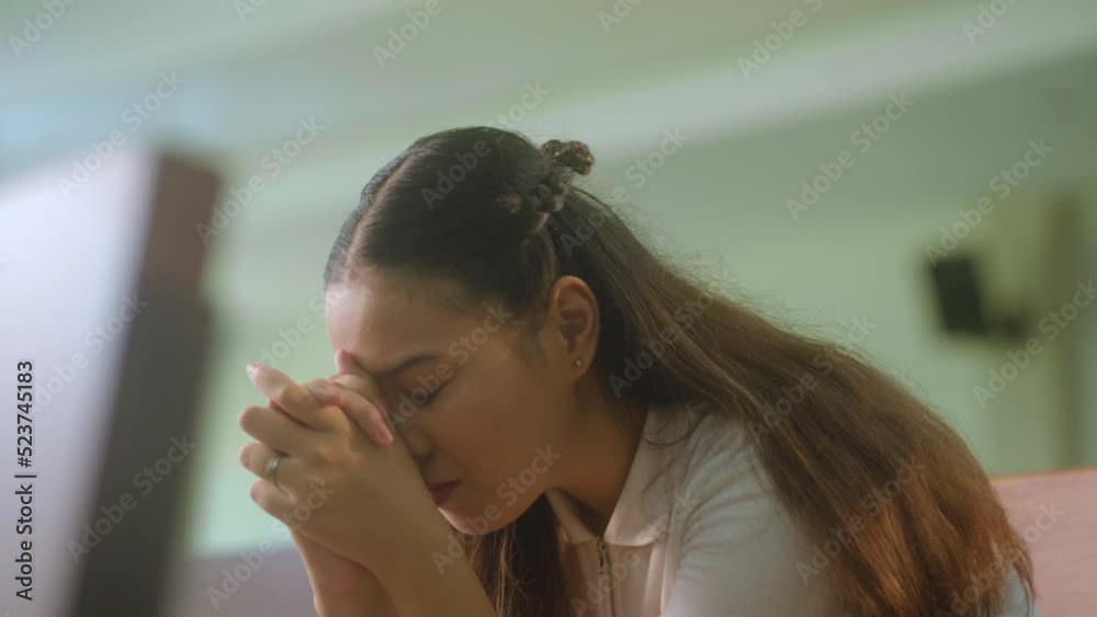 Portrait Of Young Woman Praying Inside The Chapel. Closeup Portrait Of Young Woman Praying Inside The Chapel. Closeup