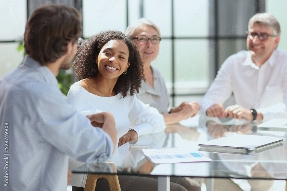 discussion of successful business people in the office discussion of successful business people in the office