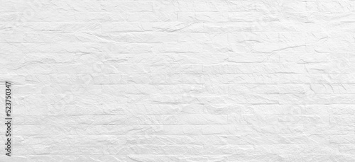 Background of white brick wall horizontal for design cement texture for pattern and backdrop. loft office style.