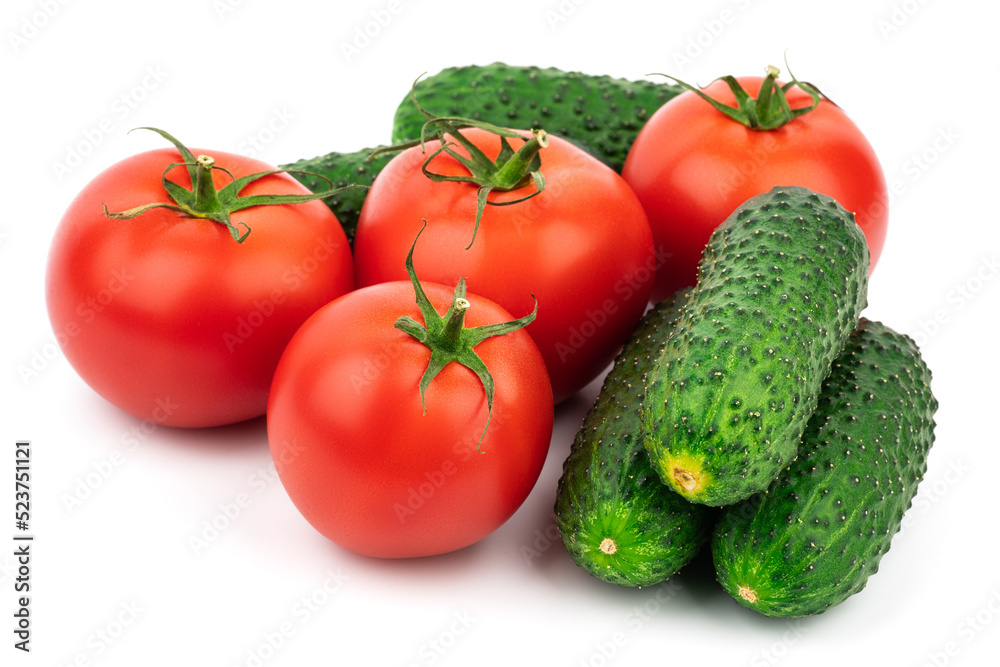 Tomatoes and cucumbers isolated on white background. Fresh vegetable isolated on white background. Tomatoes and cucumbers isolated on white background. Fresh vegetable isolated on white background.