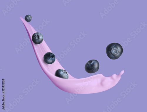 Splash of tasty blueberry yogurt and fresh berries on violet background