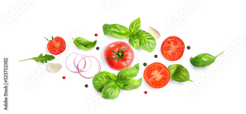 Fototapeta Naklejka Na Ścianę i Meble -  Fresh ripe tomatoes with garlic, onion, basil, arugula and peppercorns on white background, top view. Banner design