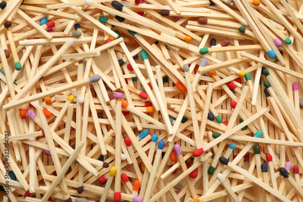 Matches with colorful heads as background, top view Matches with colorful heads as background, top view