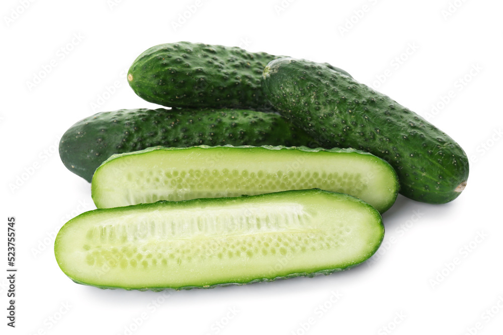 Whole and cut cucumbers on white background Whole and cut cucumbers on white background