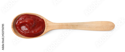 Ketchup in wooden spoon isolated on white, top view