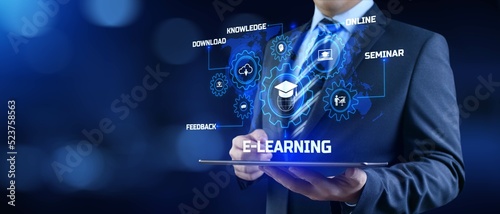 E-learning Online learning distance education concept. Businessman pressing button on screen.