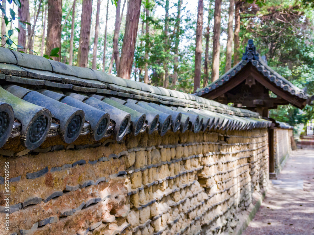 Typical Japanese traditional mud wall at the Toshodai-ji Temple in Nara, Japan. Typical Japanese traditional mud wall at the Toshodai-ji Temple in Nara, Japan.