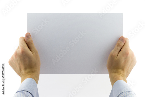 Close-up view of male hands holding blank white paper isolated on white background
