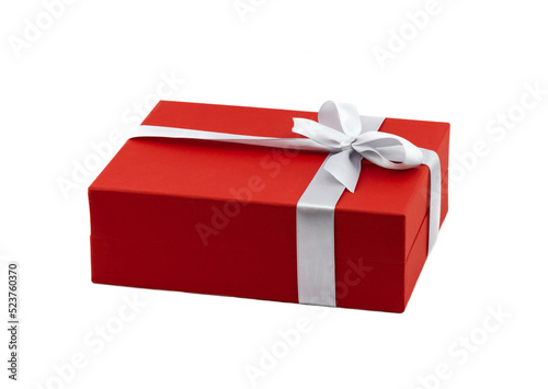 Red gift box decorated white ribbon with bow isolated on white background