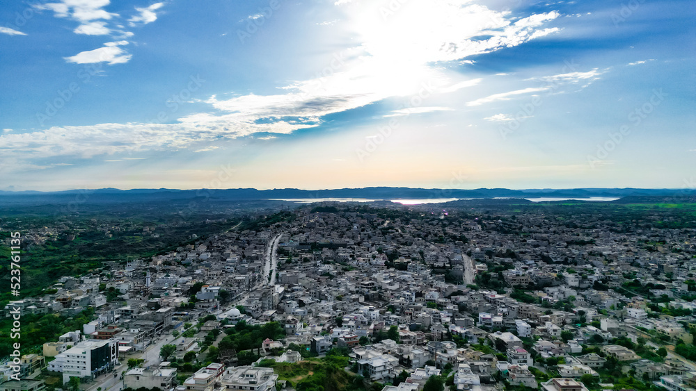 Aerial View of Mirpur Azad Kashmir city with clouds, Drone photography of Pakistan or India or South Asia