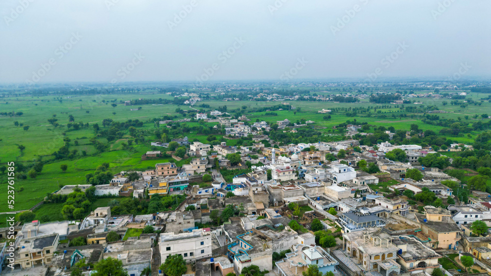 Top head view of Mirpur Azad Kashmir city shot, Buildings, houses and trafic roads, Pakistani or Indian or South Asian drone video shot