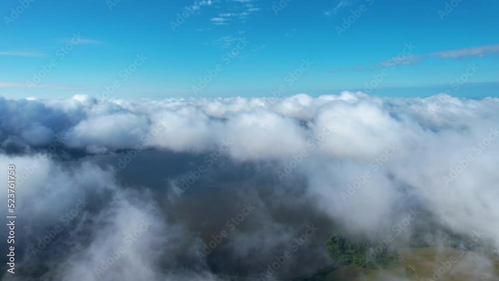 Flying over beautiful fluffy clouds Flying over beautiful fluffy clouds