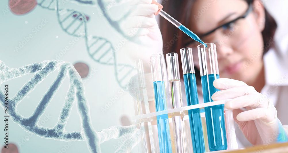 © jayzynism - Scientist with equipment and science experiments. Science research DNA protective background.