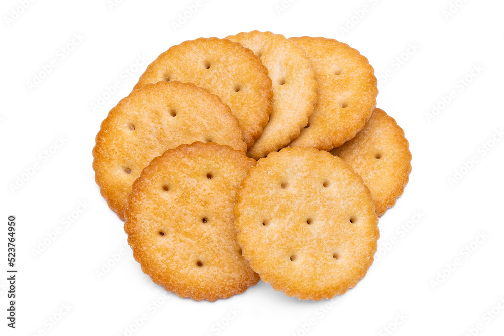 Healthy whole wheat cracker on white background. Stack of Saltine crackers isolated on white background. Round crackers. Healthy whole wheat cracker on white background. Stack of Saltine crackers isolated on white background. Round crackers.