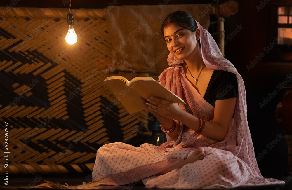 Portrait of a woman reading book at home Portrait of a woman reading book at home