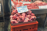 Butcher's area in Kapani Market in Thessaloniki, Greece. Container full of sheep heads for sale. Unconventional cuisine concept. High quality photo