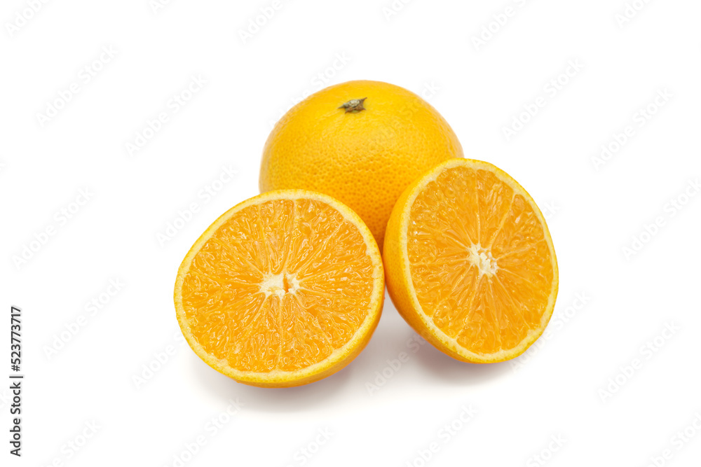 Halved oranges and oranges look fresh appetizing on white background. Halved oranges and oranges look fresh appetizing on white background.