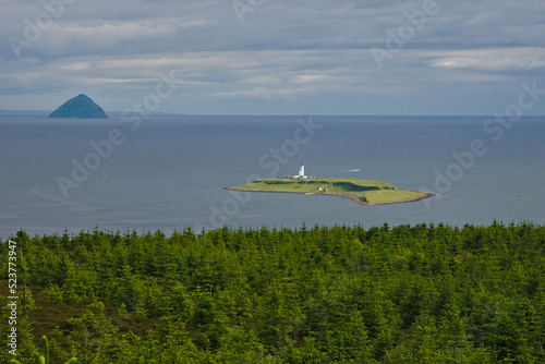 Tela Light house on Pladda and Ailsa Craig Granite Island, Firth of Clyde, from Arran