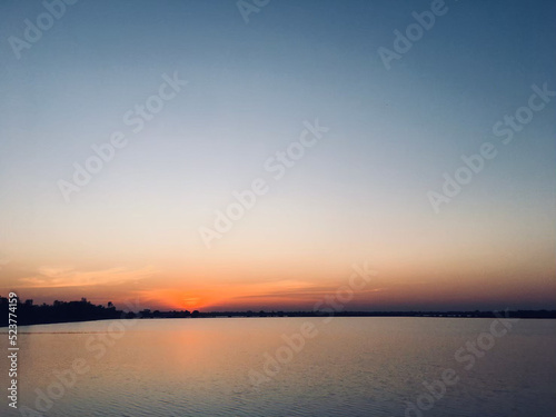 sunset over the lake © Nine