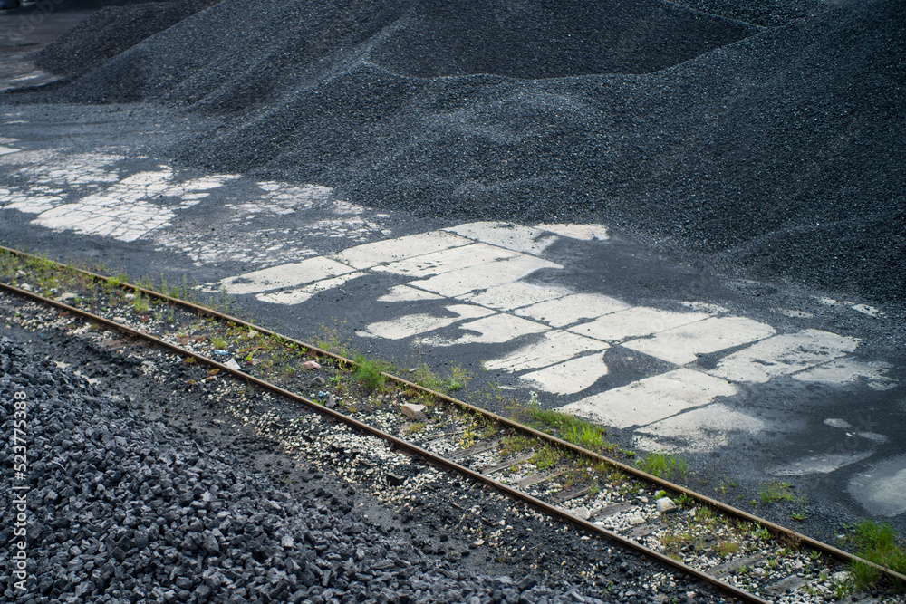 Fototapeta premium tons of coal on coal halds in storage in a coal mine