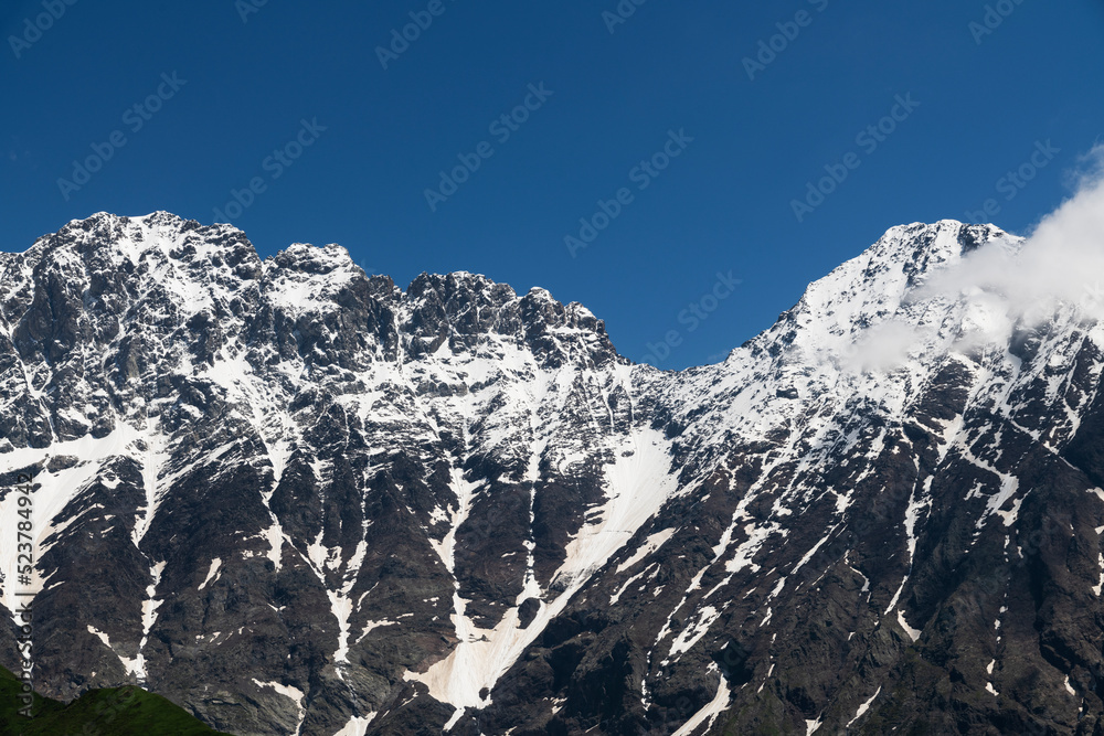 Obraz premium Snow covered mountains in winter. Mountains landscape.