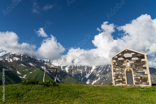 Beautiful small mountain hut in the mountains. Alpian landscape.