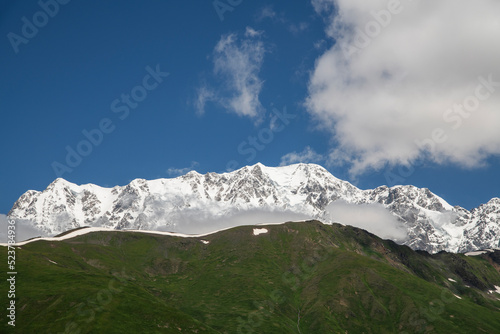 Snow covered mountains in winter. Mountains landscape.