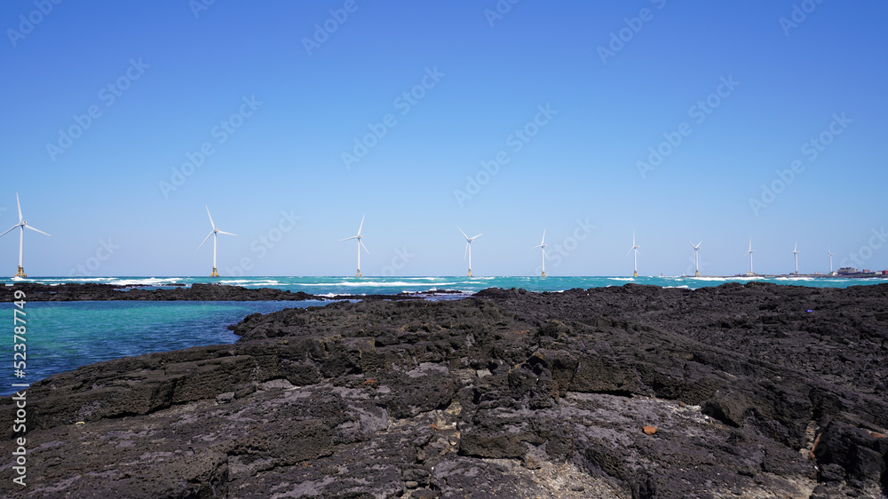 The sea off Jeju with offshore wind generators
