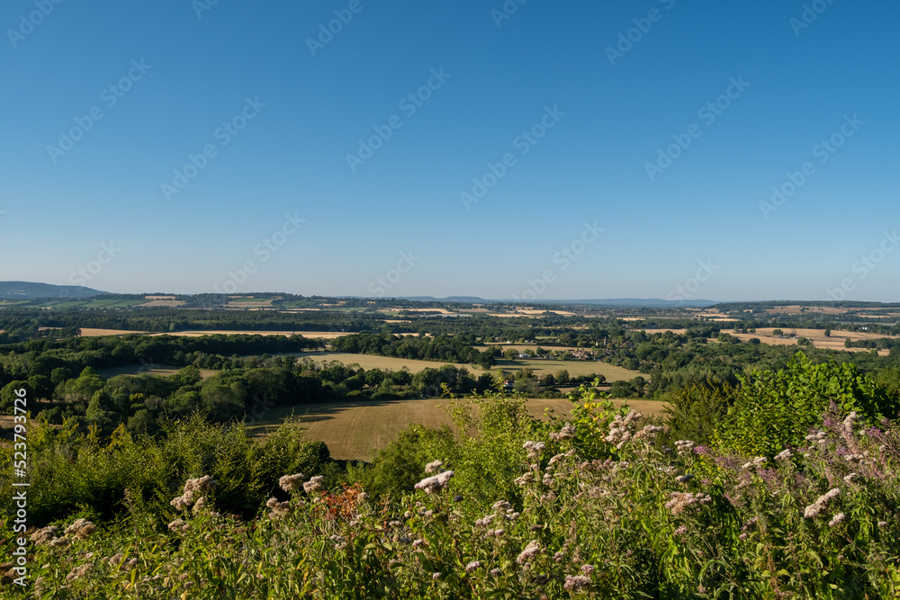 Obraz premium Looking over Duncton towards Petworth, West Sussex, UK