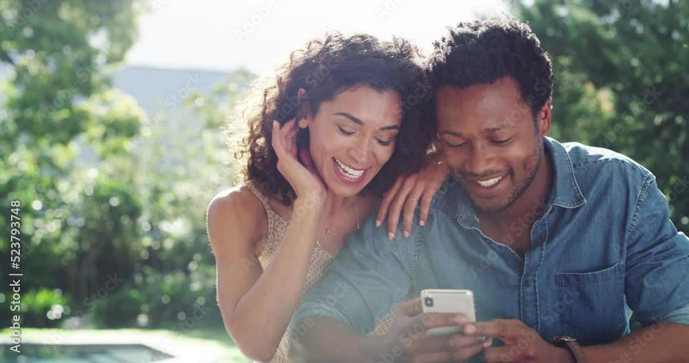 Couple browsing on phone while choosing or buying on the internet or social media while sitting together outside. Loving black man and woman talking while watching something online on mobile app