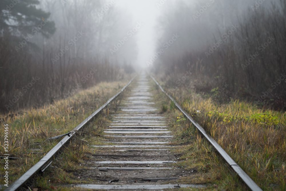 Fototapeta premium Perspective view of an old abandoned railway