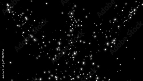 Shining glitter particles isolated on plain black background