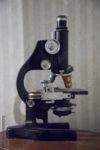 Old black microscope