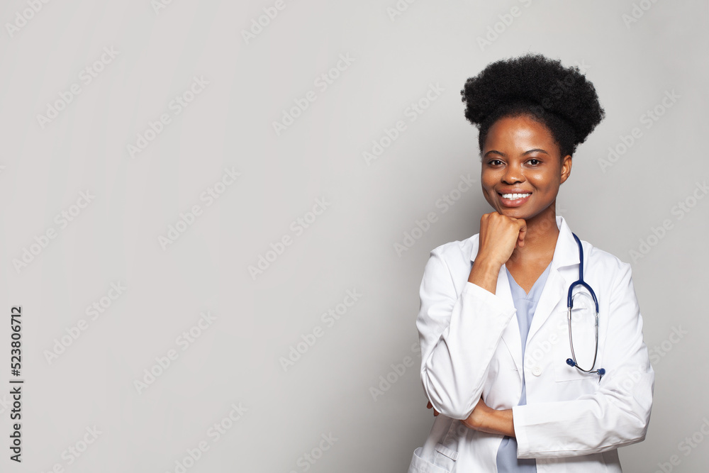 Portrait of black woman doctor with stethoscope on white background Portrait of black woman doctor with stethoscope on white background