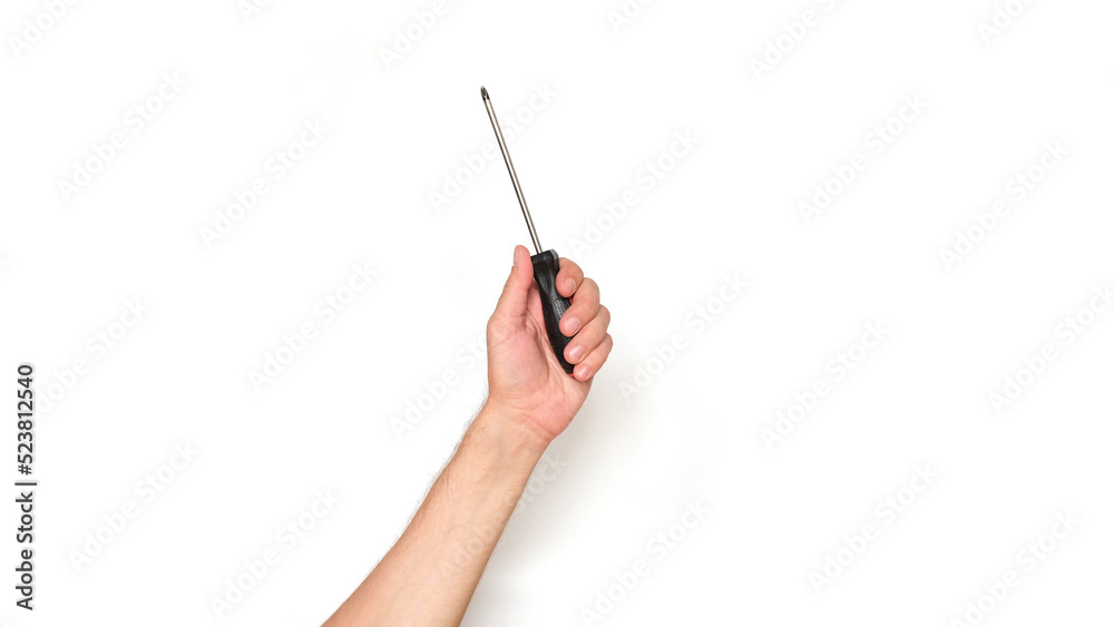 Male hand holding a screwdriver on a white background Male hand holding a screwdriver on a white background