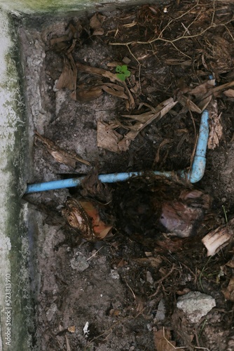 A mistake at the tree roots pushes the blue water pipe, bending away from normal.