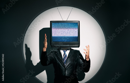 Man with TV instead of head. Media zombie concept