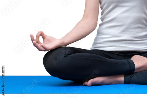 Healthy asian woman meditates while practicing yoga