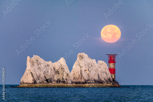 Setting full sturgeon moon setting over the Needles Rocks