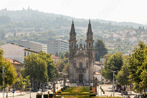 Guimaraes, Portugal. The Igreja de Sao Gualter (St Walter Church) and the avenue called Largo Republica do Brasil photo