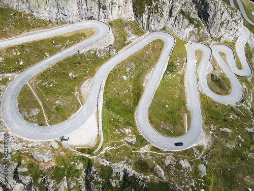 Drone view at Tremola the old road to Gotthard pass in Switzerland photo