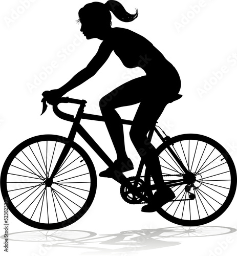 A woman bicycle riding bike...