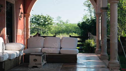 sofas on the terrace patio of a hacienda, Mexico © Gnac49