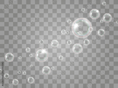 Air soap bubbles on a transparent background .Vector illustration of bulbs.   © Olga