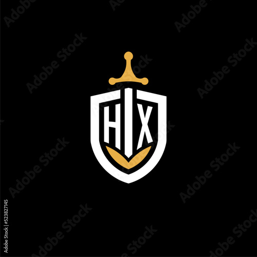 Creative letter HX logo gaming esport with shield and sword design ideas