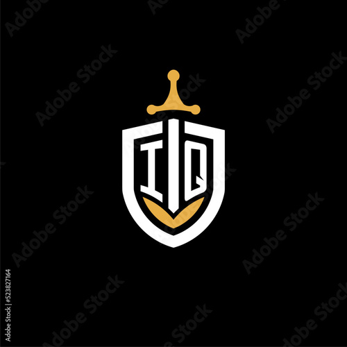 Creative letter IQ logo gaming esport with shield and sword design ideas