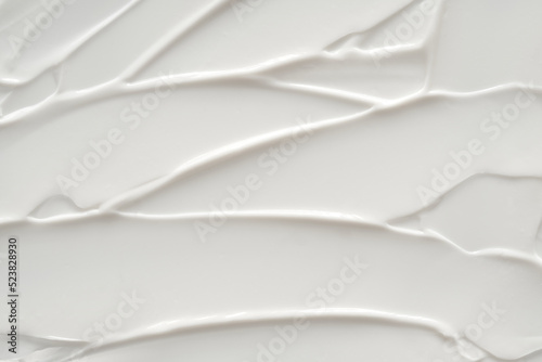 Creamy foundation texture isolated. Smear of face cream isolated. Texture of cream background © Artem Mykhailichenko