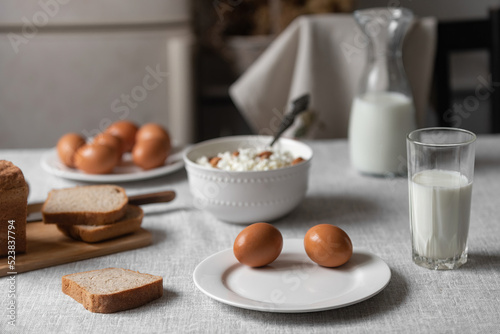 family breakfast in the morning, linen tablecloth and natural, healthy products